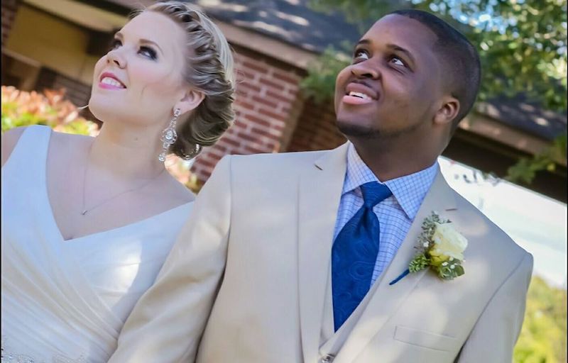 Michael Lacy and his wife Taylor on their wedding day