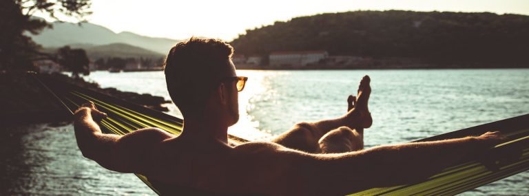 Man Relaxing in a hammock