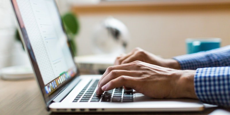 typing on a laptop