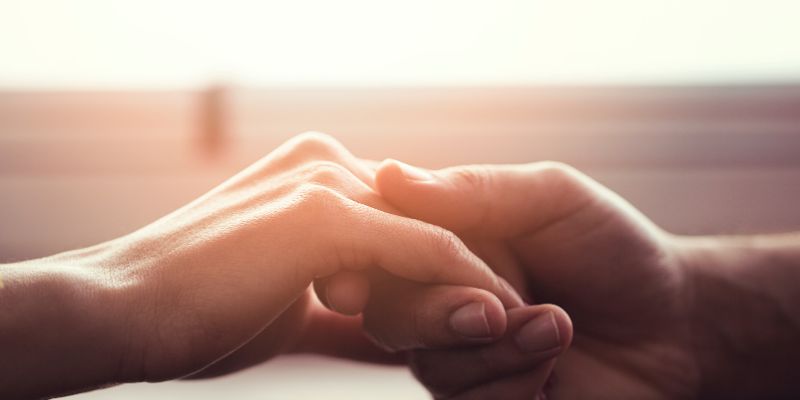 couple holding hands