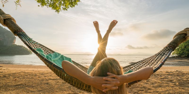 woman relaxing on hammock