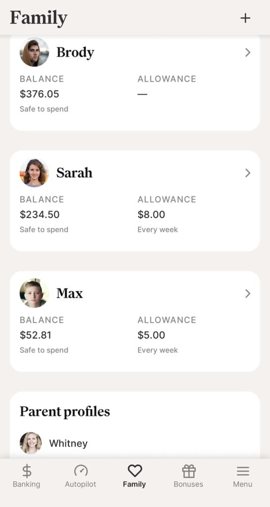 Crew family banking app showing savings and spending accounts