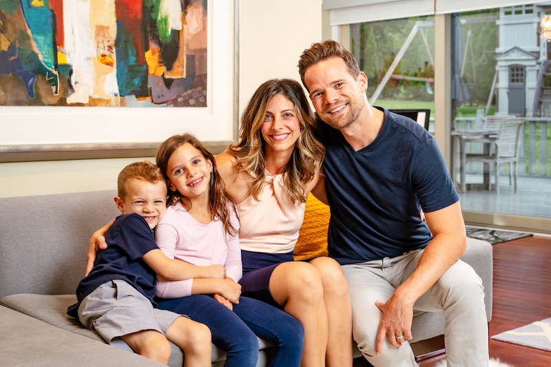 Andy Hill enjoying time with his family after building systems that simplify running his small business.