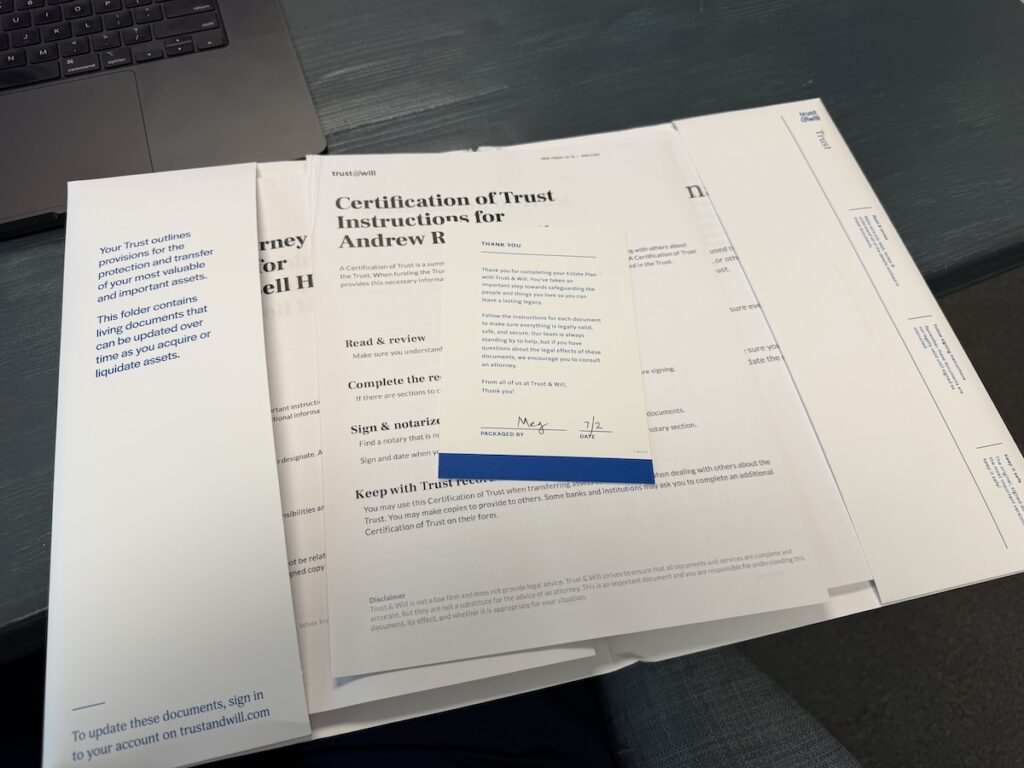 Trust & Will estate planning documents inside a trust folder, including a certification of trust and instructions for completing the estate plan.