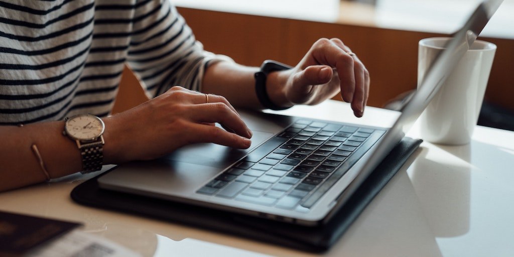 typing on laptop